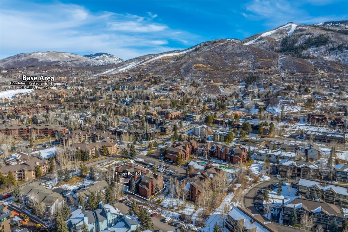 2015 Walton Creek Road, Unit 105 Steamboat Springs, CO 80487 - Photo 25 of 34 an aerial view of residential houses with outdoor space