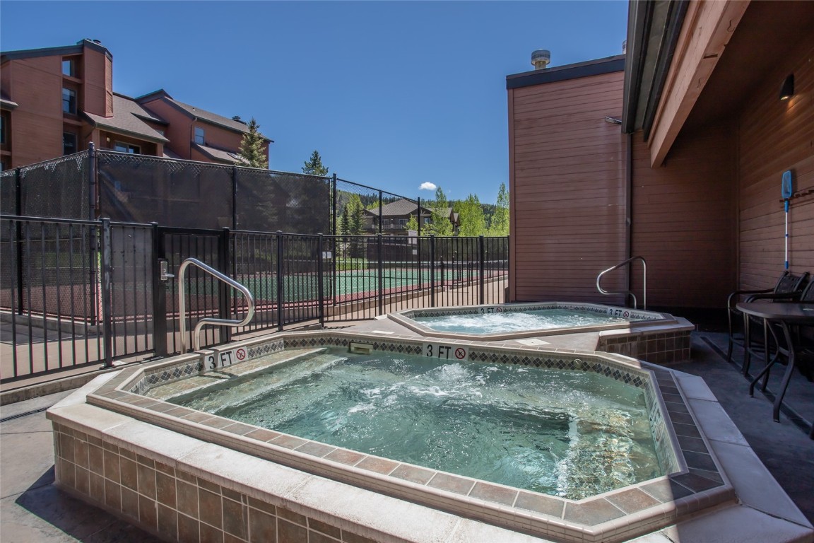 2015 Walton Creek Road, Unit 105 Steamboat Springs, CO 80487 - Photo 30 of 34 a view of a backyard with sitting area