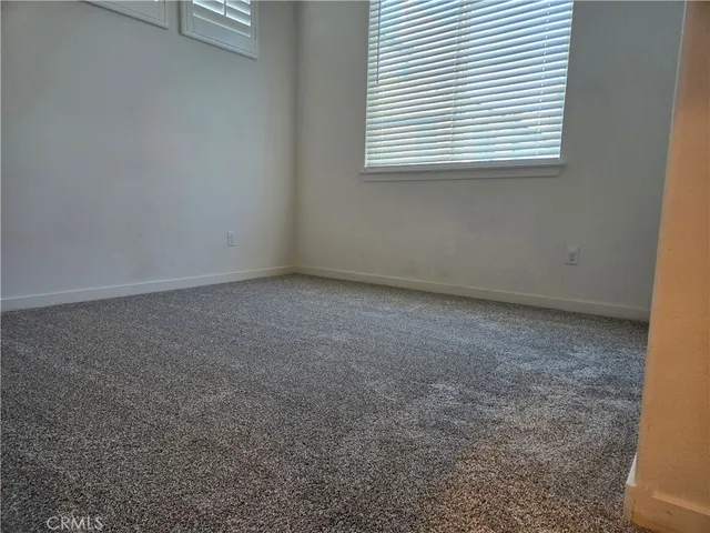 a bathroom with a shower curtain