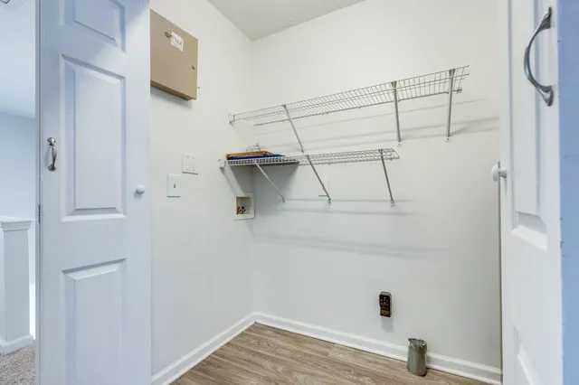 a view of a room with racks on the wall