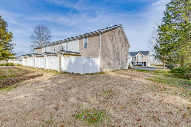 a house view with a backyard space