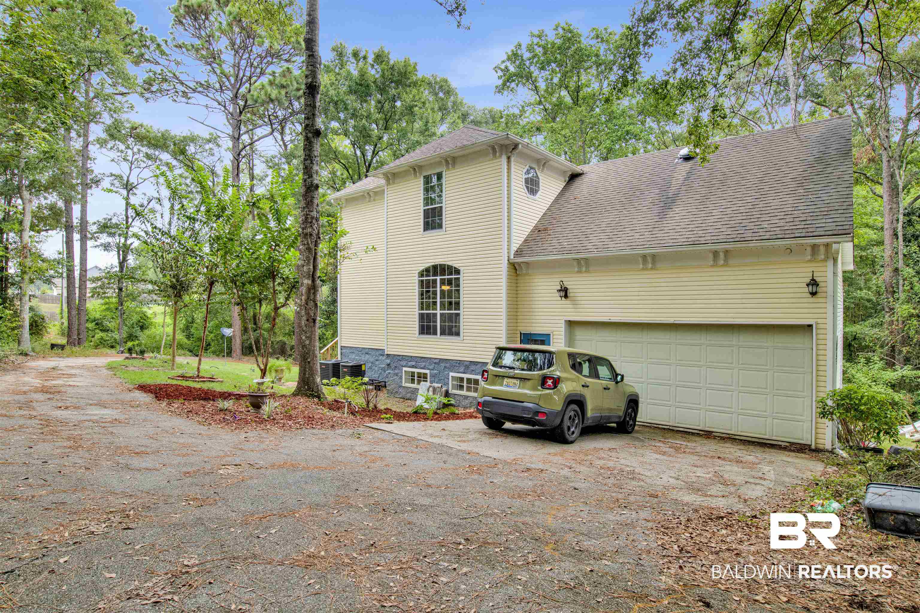 7641 Hitt Road Mobile, AL 36695 - Photo 29 of 29 Exterior space with a garage