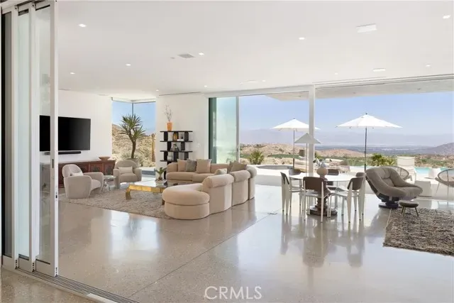 a lobby with furniture and outdoor view