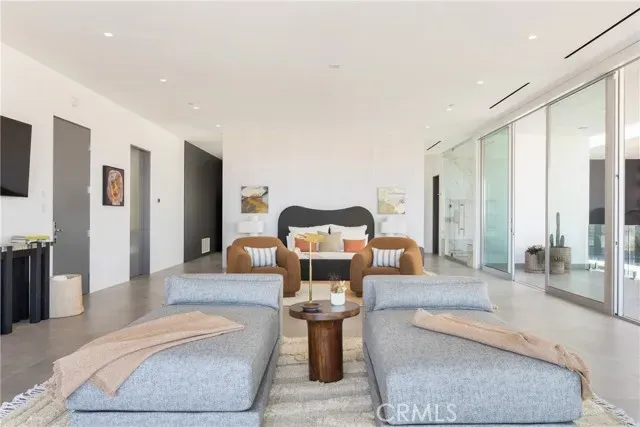 a bathroom with a tub and shower