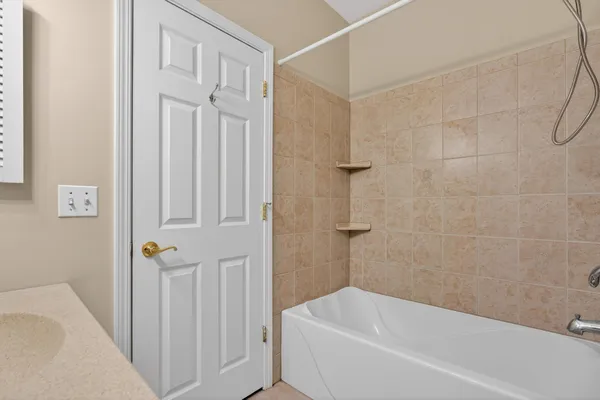 a bathroom with a bathtub