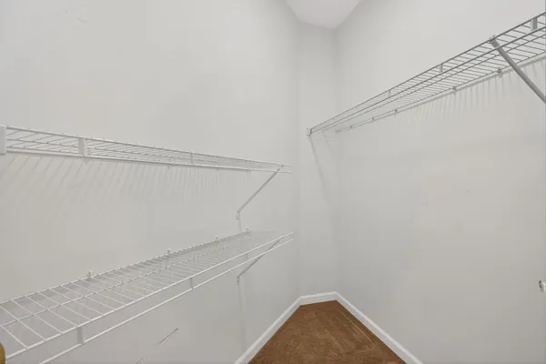 a view of a room with racks on the wall