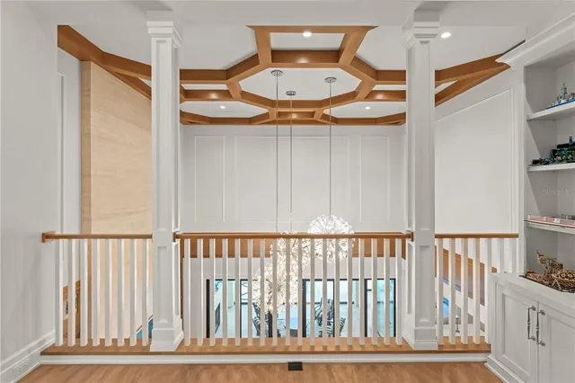 a view of a hardwood & staircase