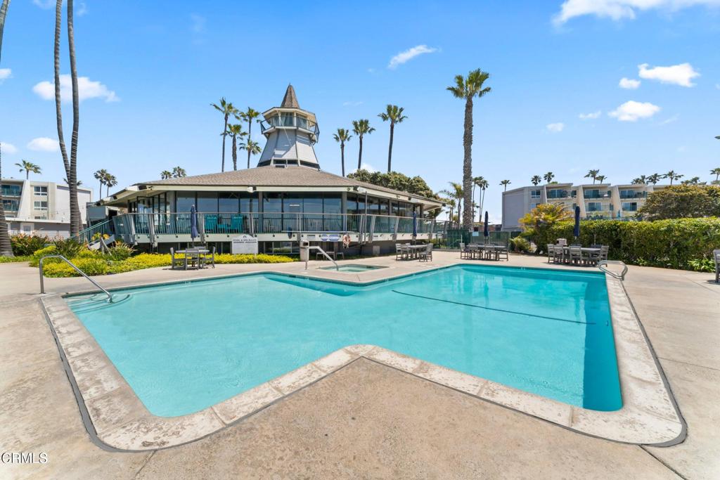 2901 Peninsula Road, Unit 333 Oxnard, CA 93035 - Photo 10 of 11 a view of a swimming pool with a lounge chairs