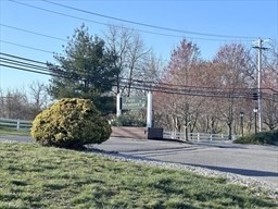 241 Broadway Road, Unit 53 Dracut, MA 01826 - Photo 24 of 24 a view of a back yard of the house