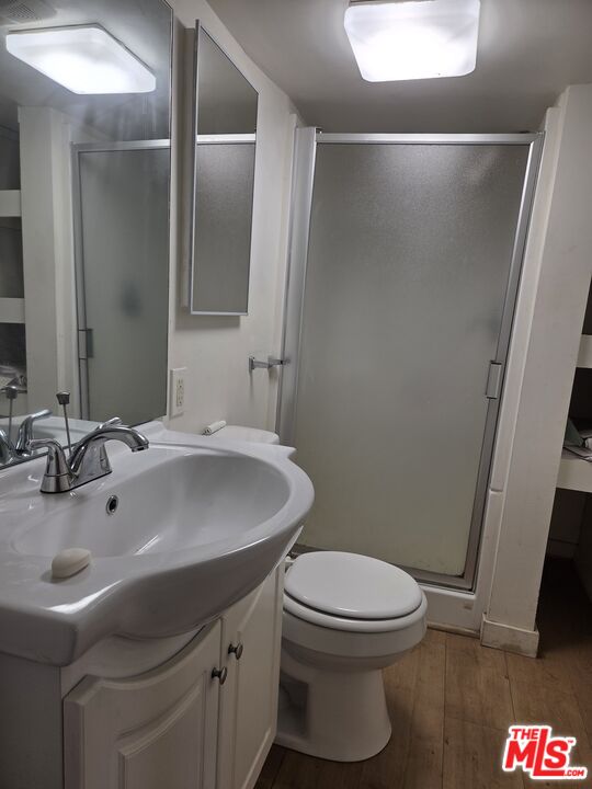 1612 Arlington Avenue Los Angeles, CA 90019 - Photo 24 of 24 a bathroom with a sink and a toilet