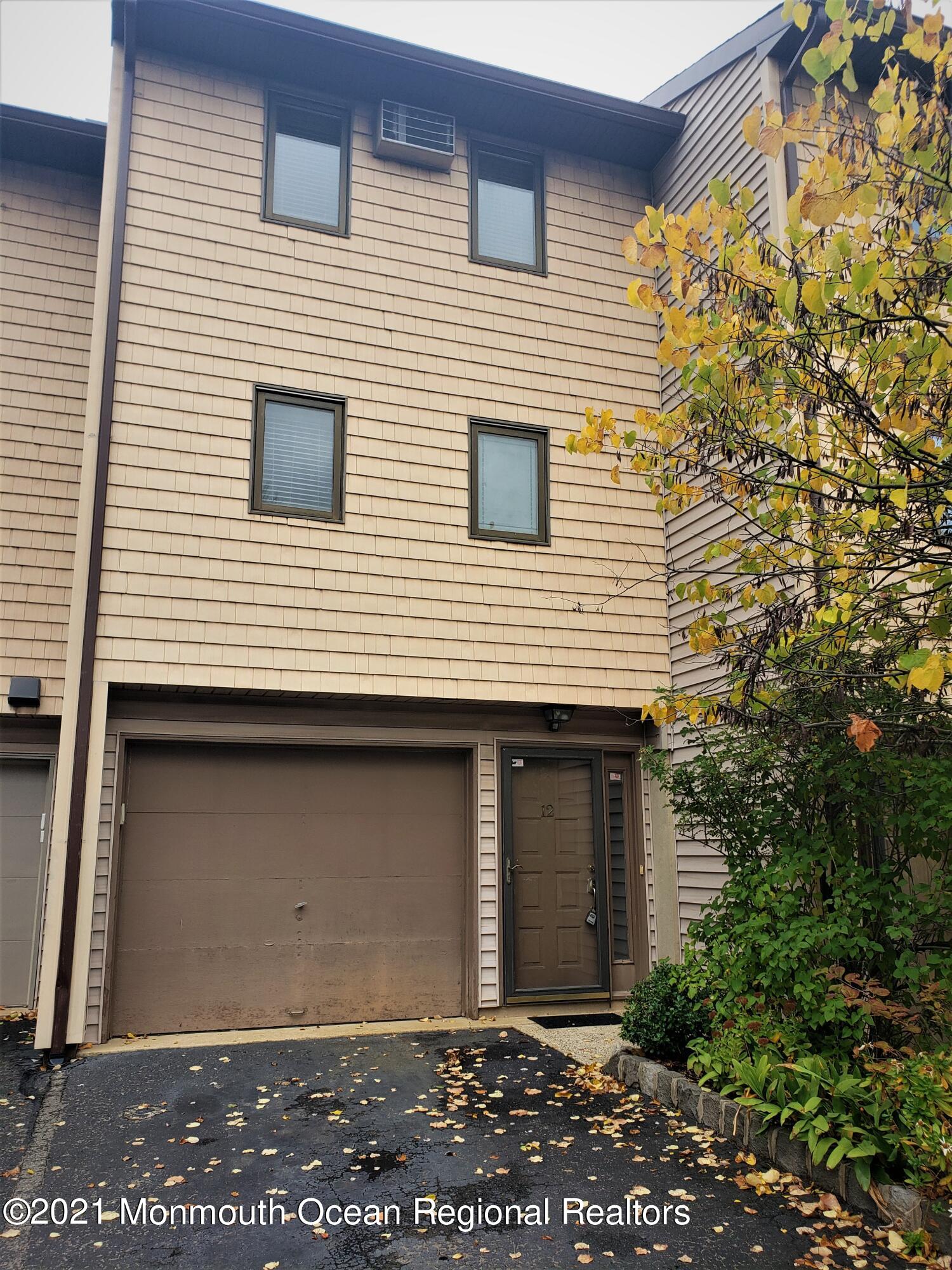 a view of a house with a garage