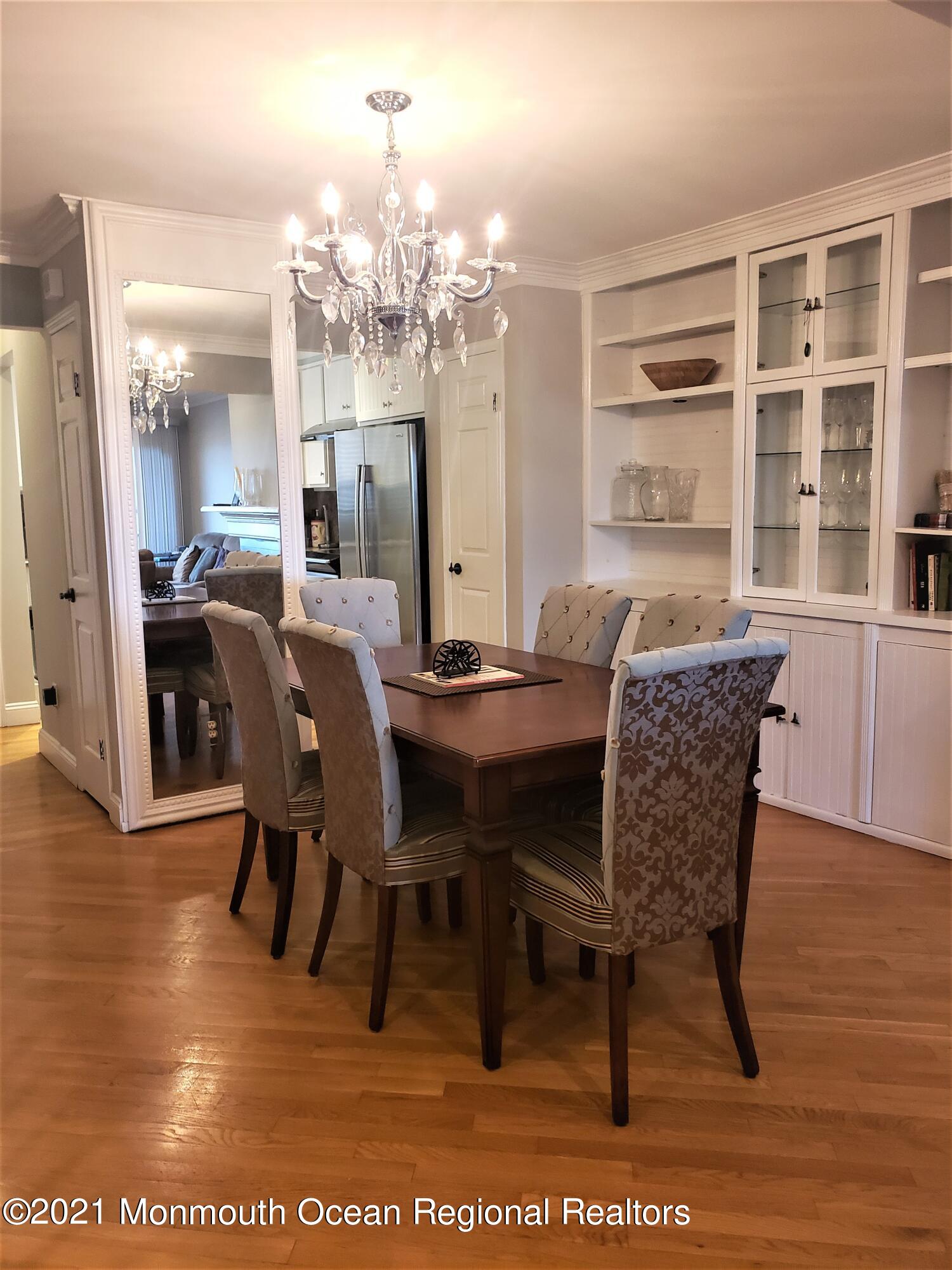 164 Linden Avenue, Unit 12 Highlands, NJ 07732 - Photo 2 of 8 a view of a dining room with furniture
