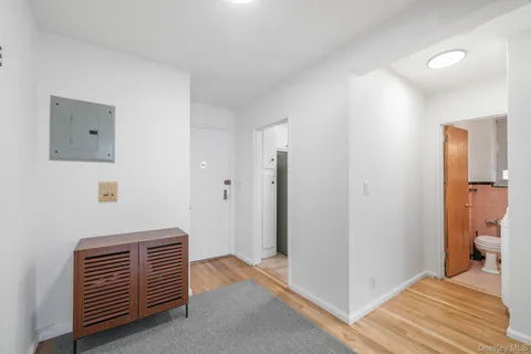 a view of room with wooden floor