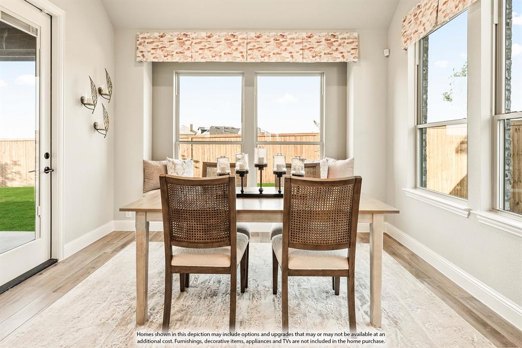 5422 Rutherford Drive Midlothian, TX 76065 - Photo 12 of 36 a dining room with furniture and window