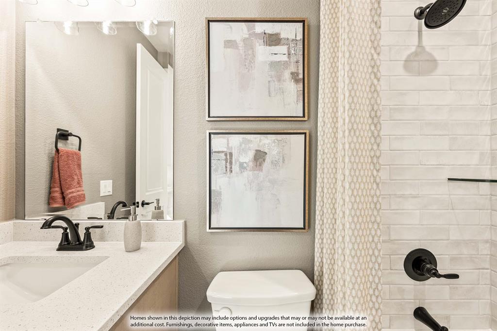 5422 Rutherford Drive Midlothian, TX 76065 - Photo 23 of 36 a bathroom with a tub sink and mirror