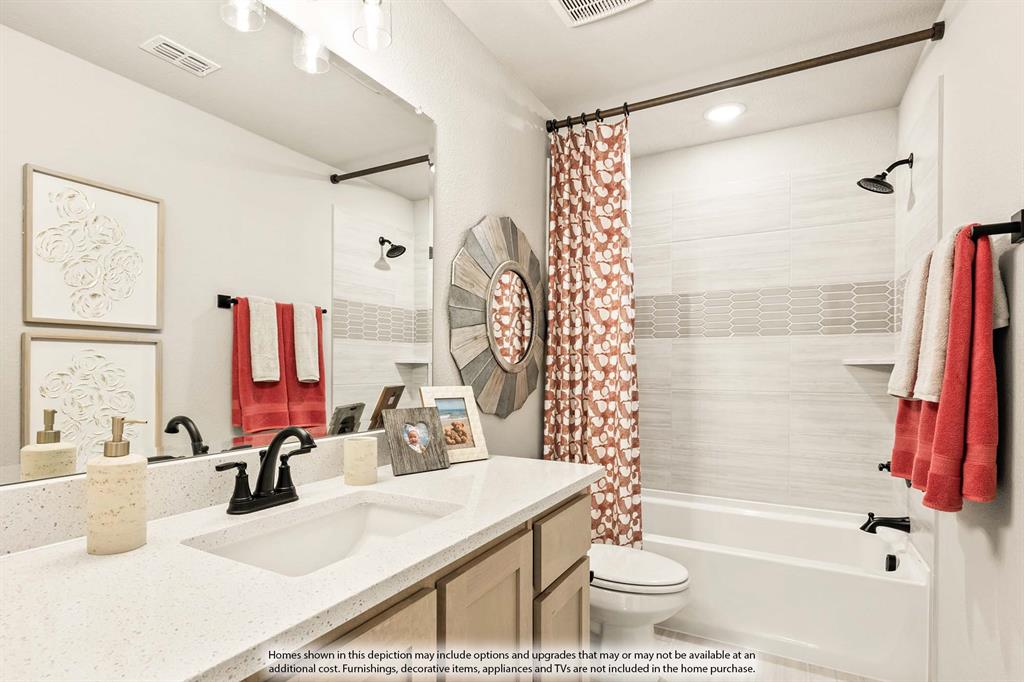 5422 Rutherford Drive Midlothian, TX 76065 - Photo 32 of 36 a bathroom with a sink toilet and shower