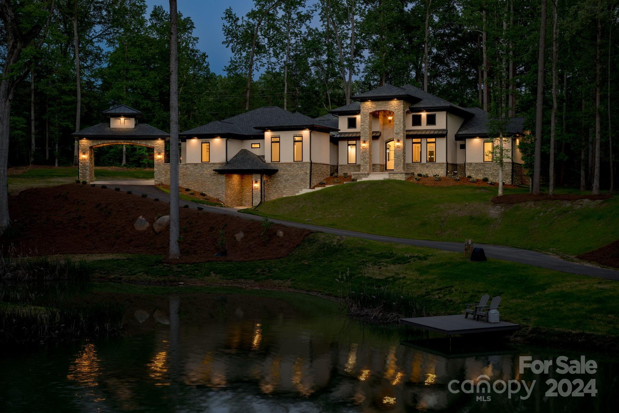 10290 Enclave Circle Concord, NC 28027 - Photo 11 of 48 a front view of a house with garden