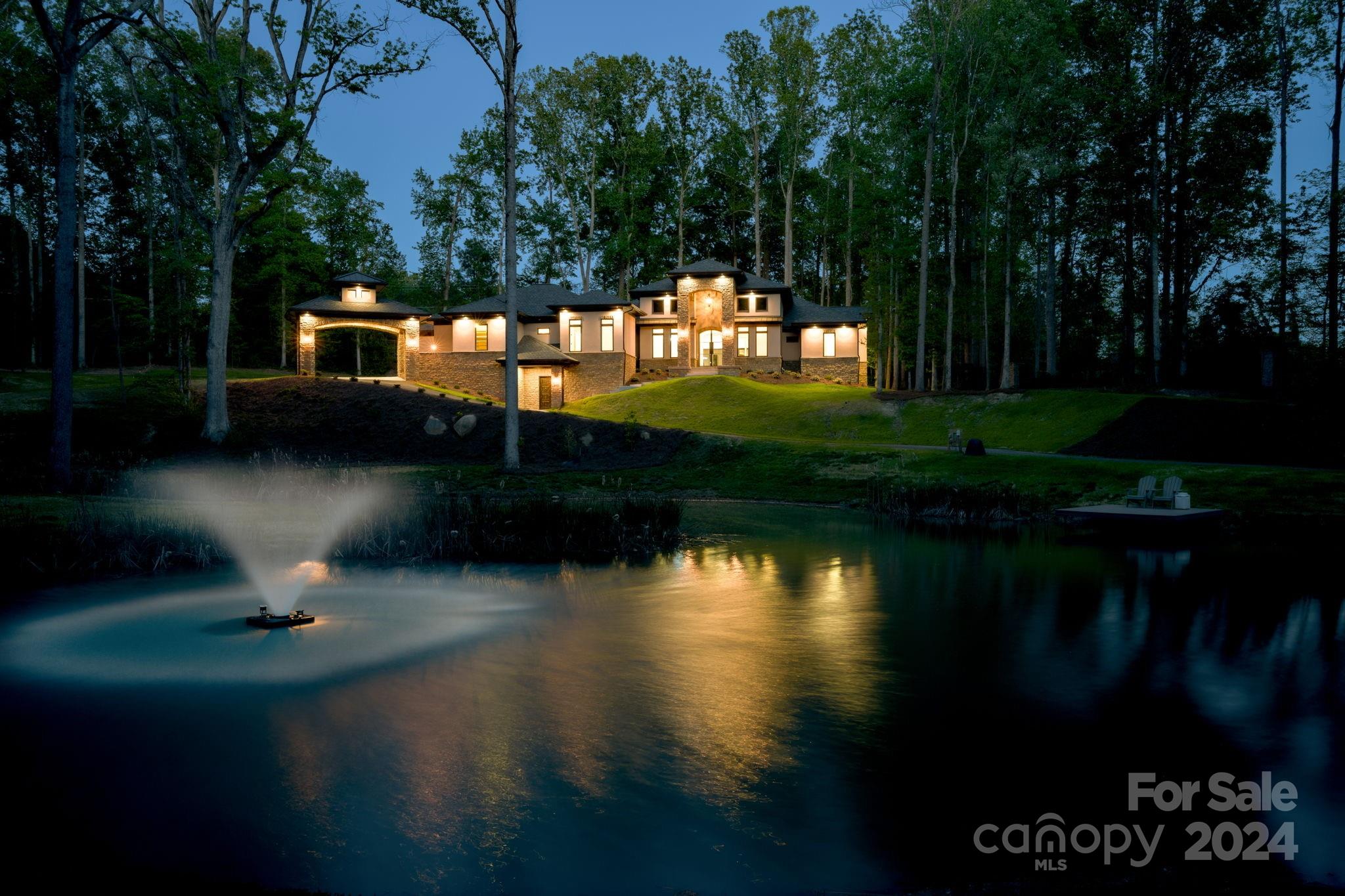 10290 Enclave Circle Concord, NC 28027 - Photo 12 of 48 a view of a lake from a yard