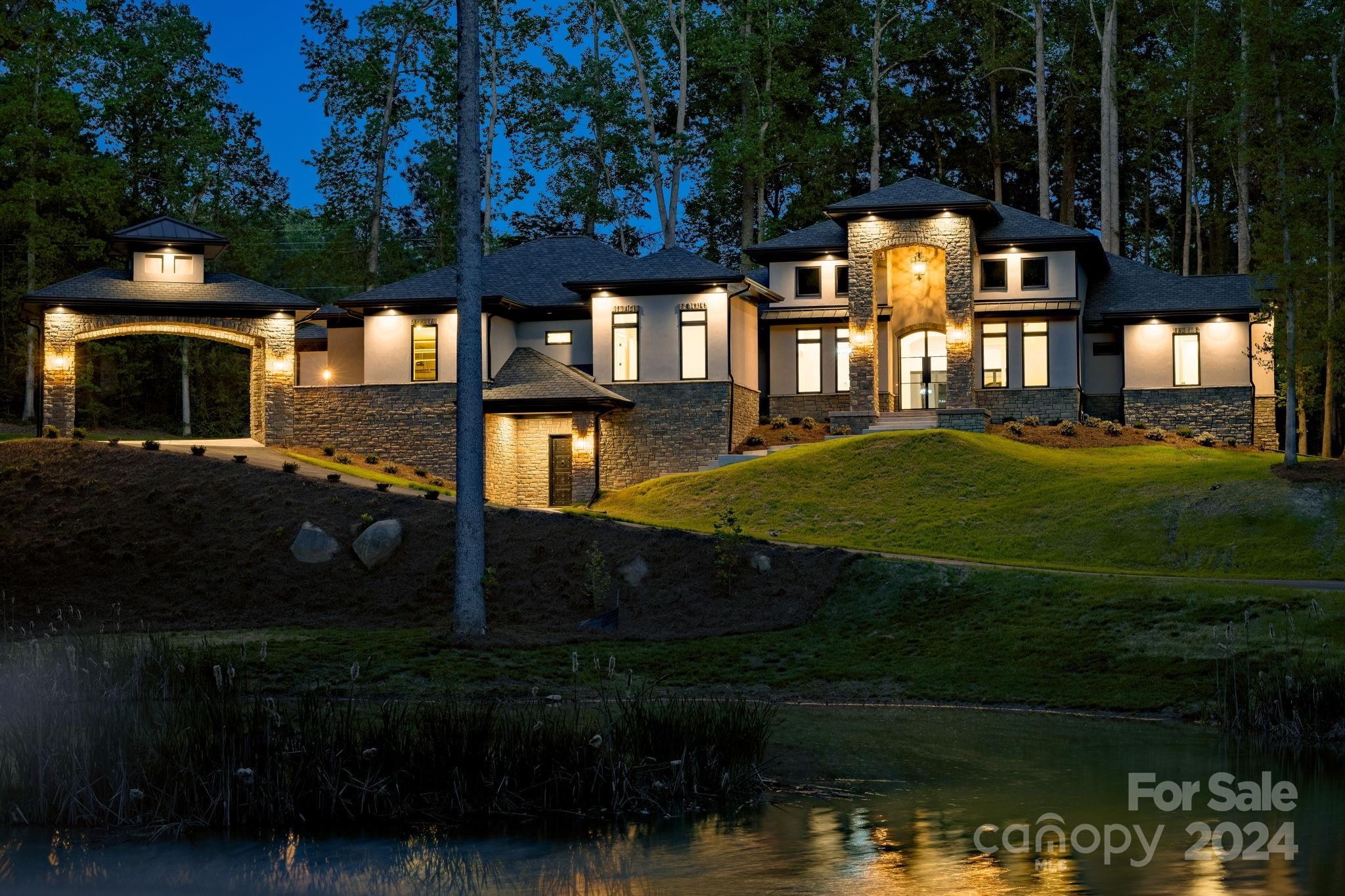 10290 Enclave Circle Concord, NC 28027 - Photo 13 of 48 a front view of a house with garden
