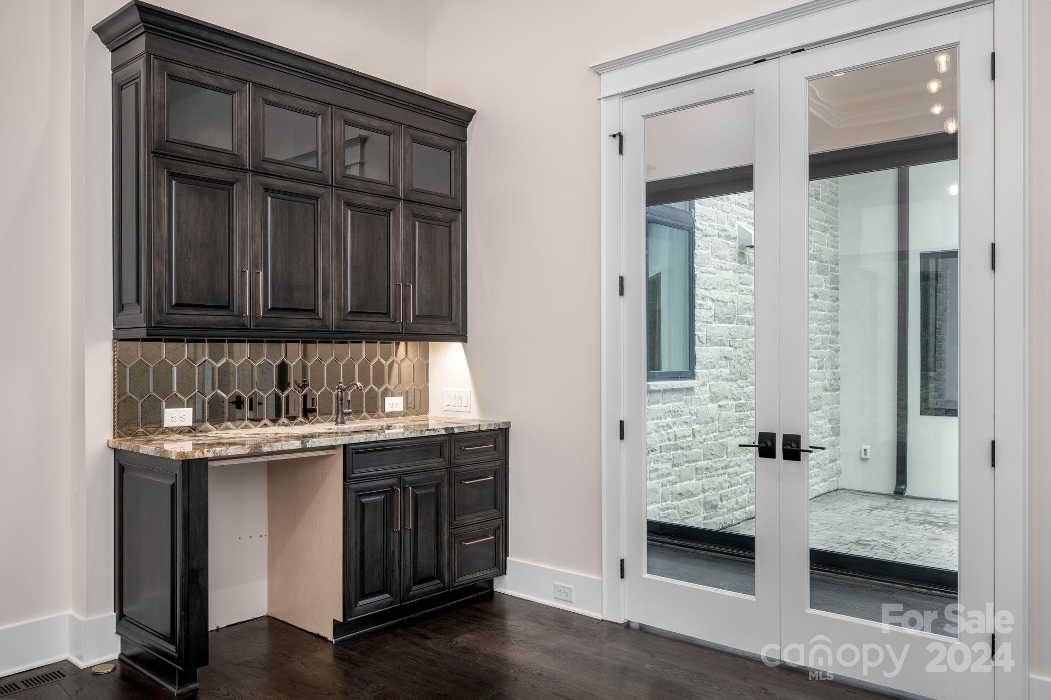 10290 Enclave Circle Concord, NC 28027 - Photo 41 of 48 a kitchen with stainless steel appliances granite countertop a stove and a refrigerator