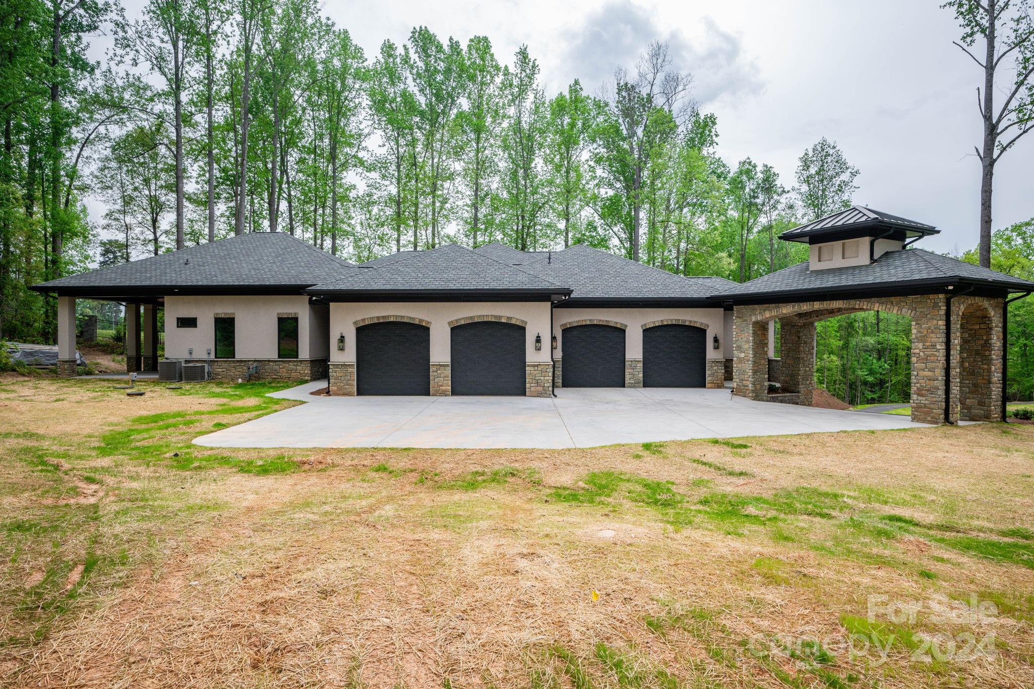 10290 Enclave Circle Concord, NC 28027 - Photo 46 of 48 a front view of a house with a yard