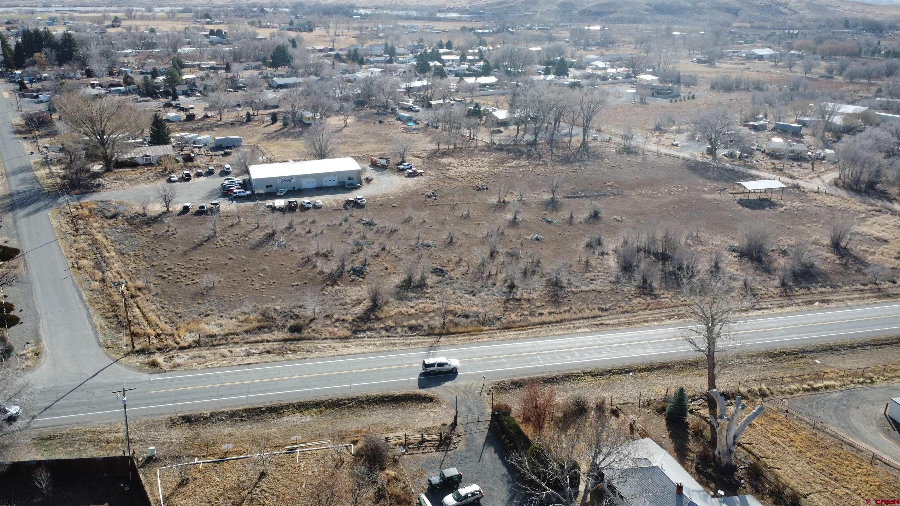 21245 Morris Road Eckert, CO 81418 - Photo 1 of 7 a view of water heater and covered with wooden floor