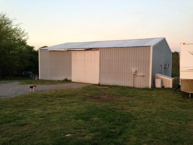 205 Providence Road Hartsville, TN 37087 - Photo 6 of 20 Large, Detached Garage/Shop is has Electricity, as well as a Heated/Cooled Office Space