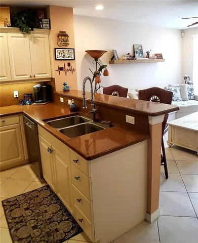 a bedroom with a bed and lamp