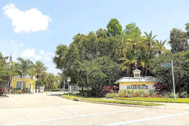 a view of a house with a iron gate