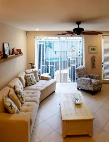 a room with furniture and a flat screen tv