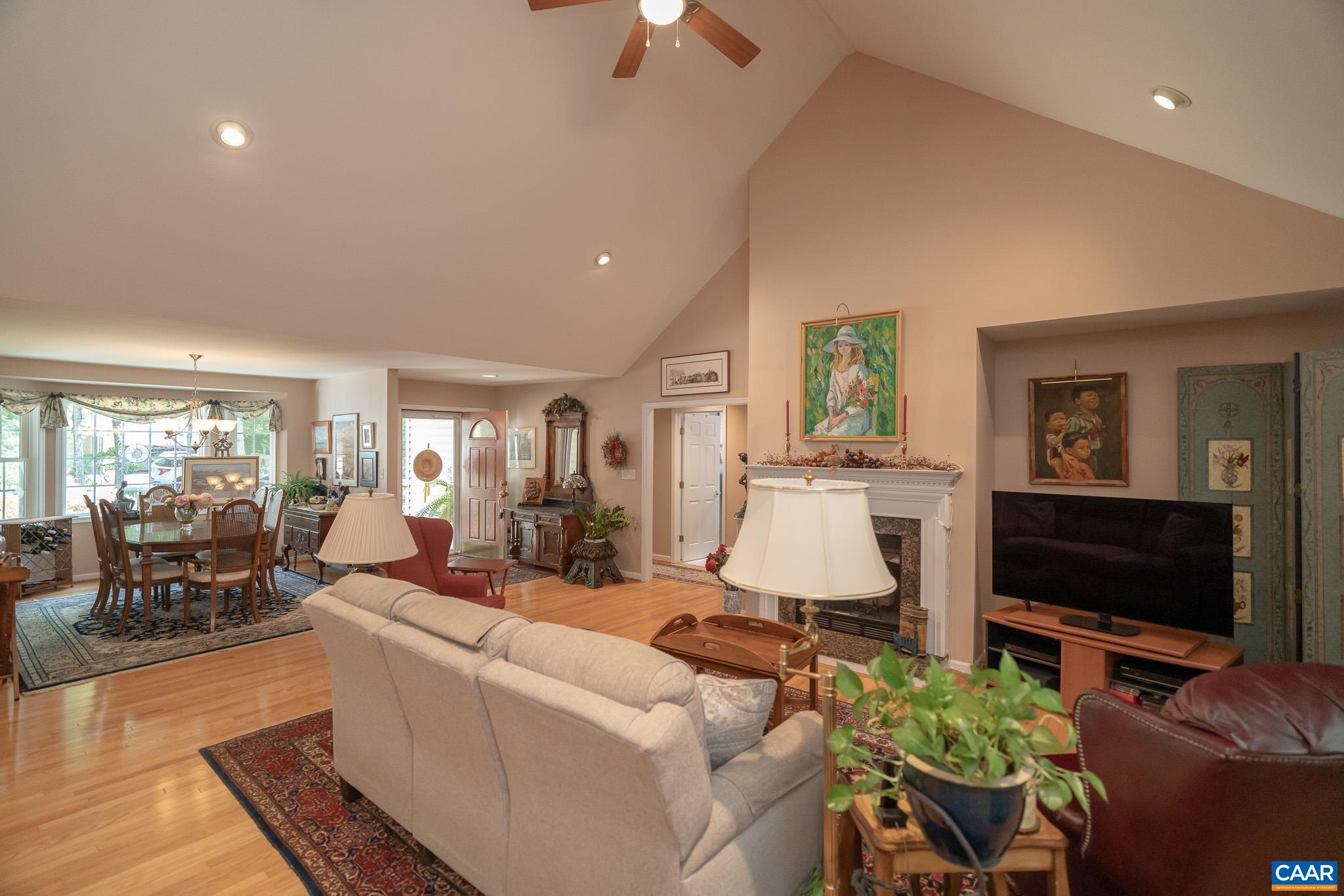 9 Hawks Place Palmyra, VA 22963 - Photo 12 of 63 a living room with furniture and a flat screen tv