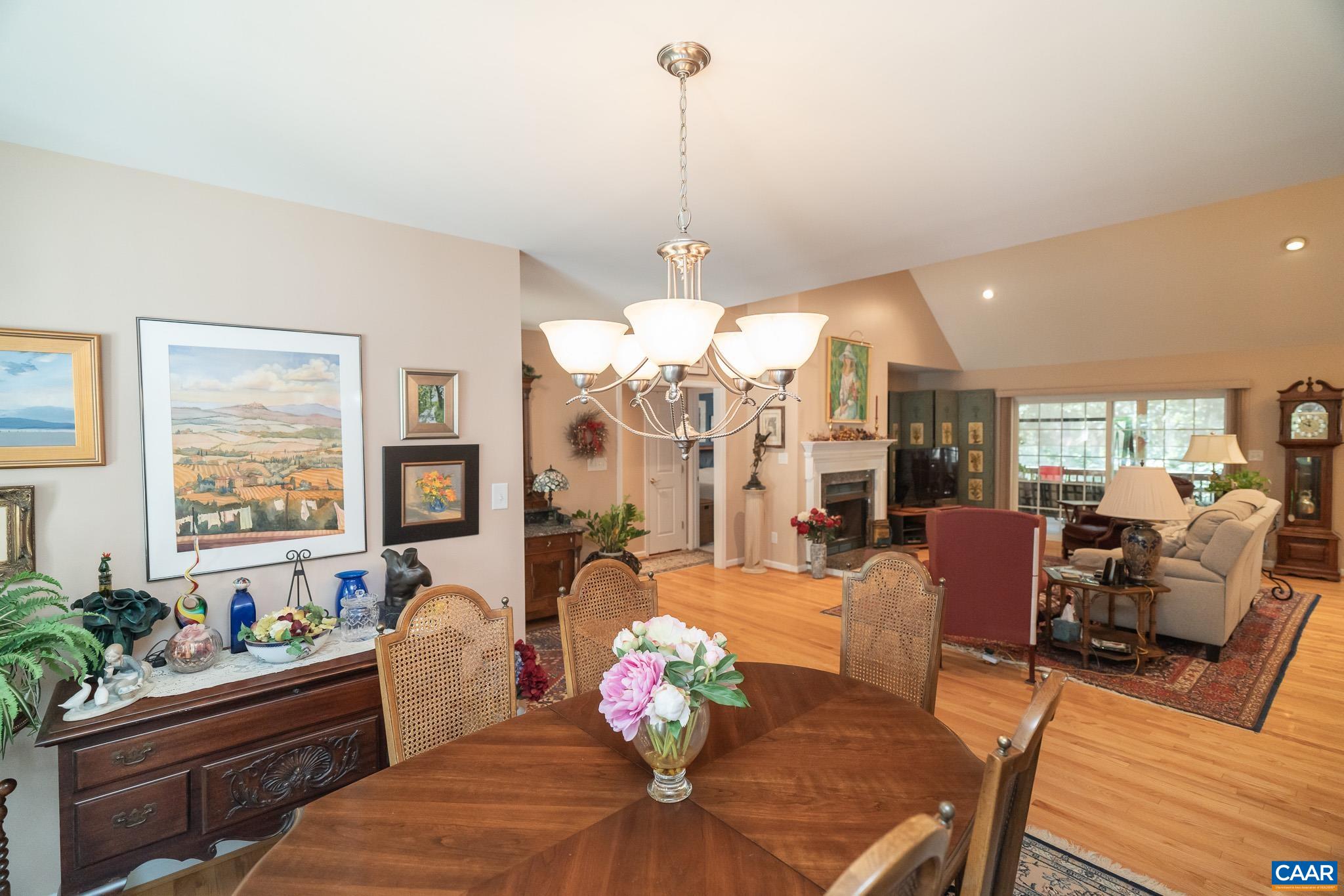 9 Hawks Place Palmyra, VA 22963 - Photo 14 of 63 a living room with furniture chandelier and a window