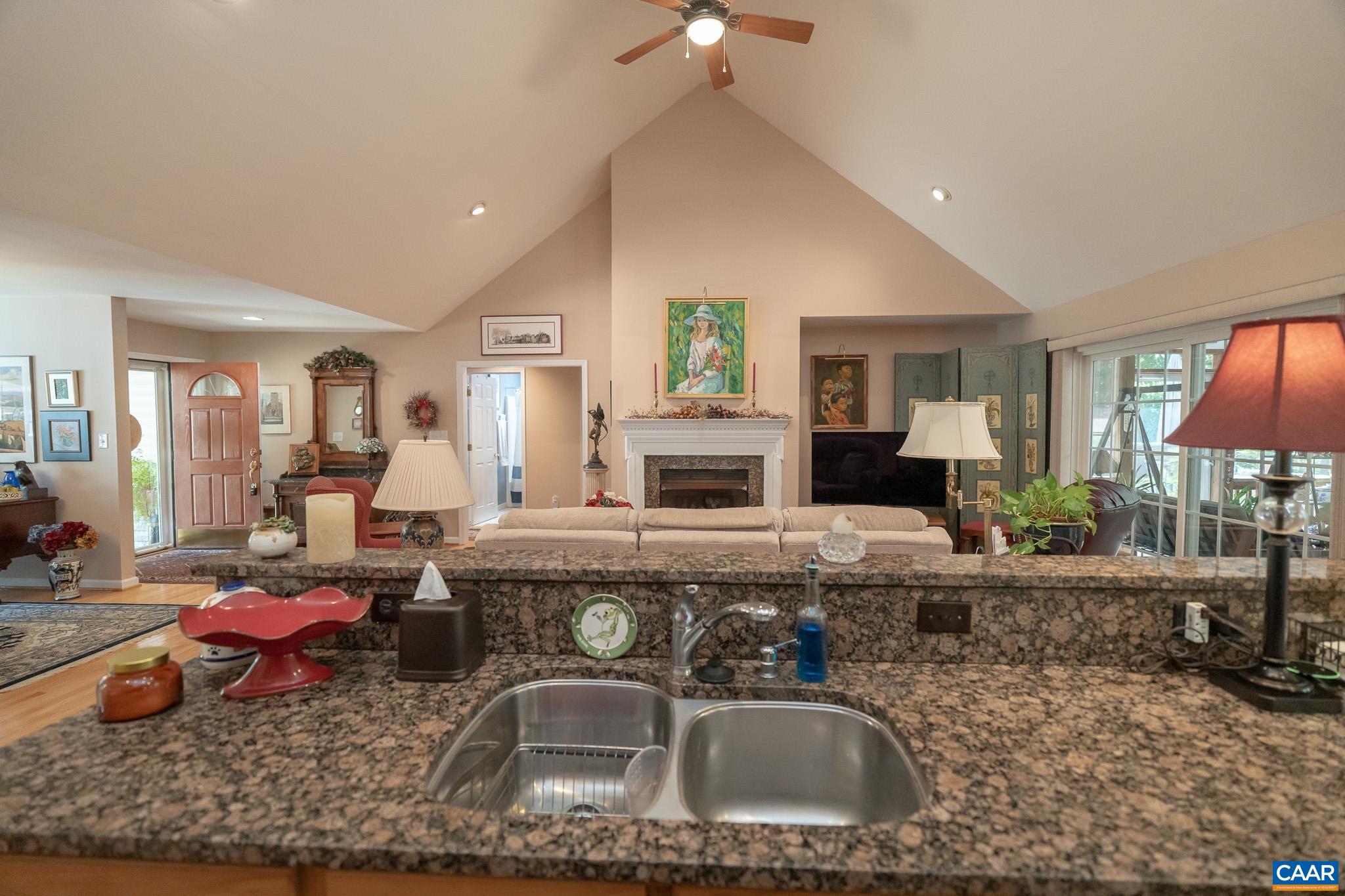 9 Hawks Place Palmyra, VA 22963 - Photo 15 of 63 a living room with furniture a table and chairs