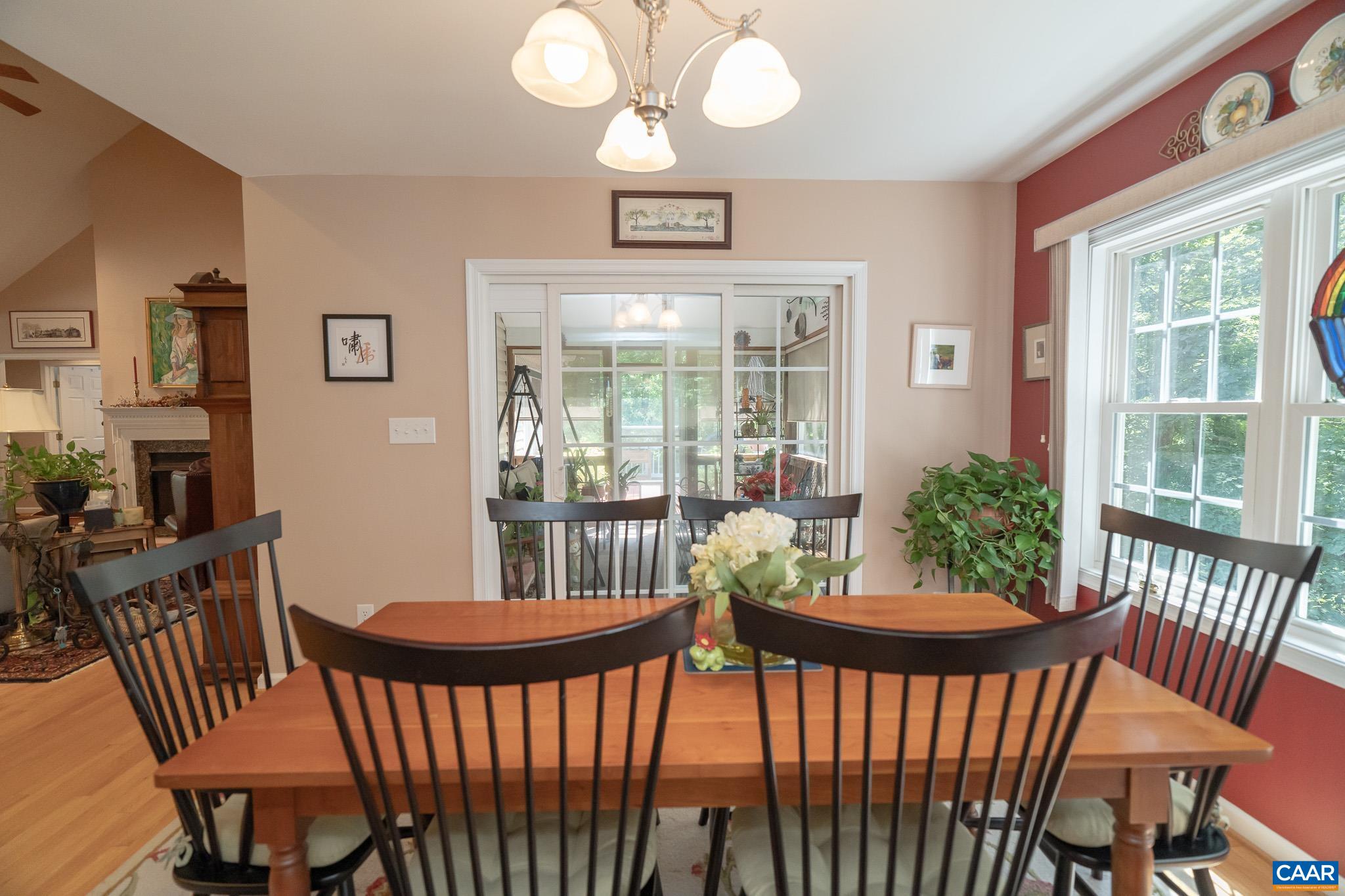 9 Hawks Place Palmyra, VA 22963 - Photo 19 of 63 a view of a dining room with furniture window and wooden floor