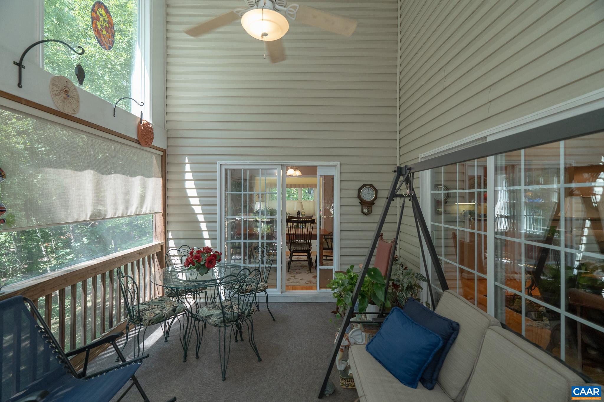 9 Hawks Place Palmyra, VA 22963 - Photo 20 of 63 a view of a chair and tables in patio of the house