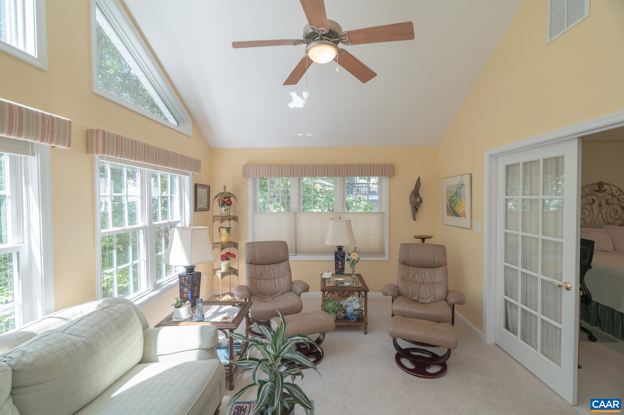 9 Hawks Place Palmyra, VA 22963 - Photo 25 of 63 a living room with furniture and a large window