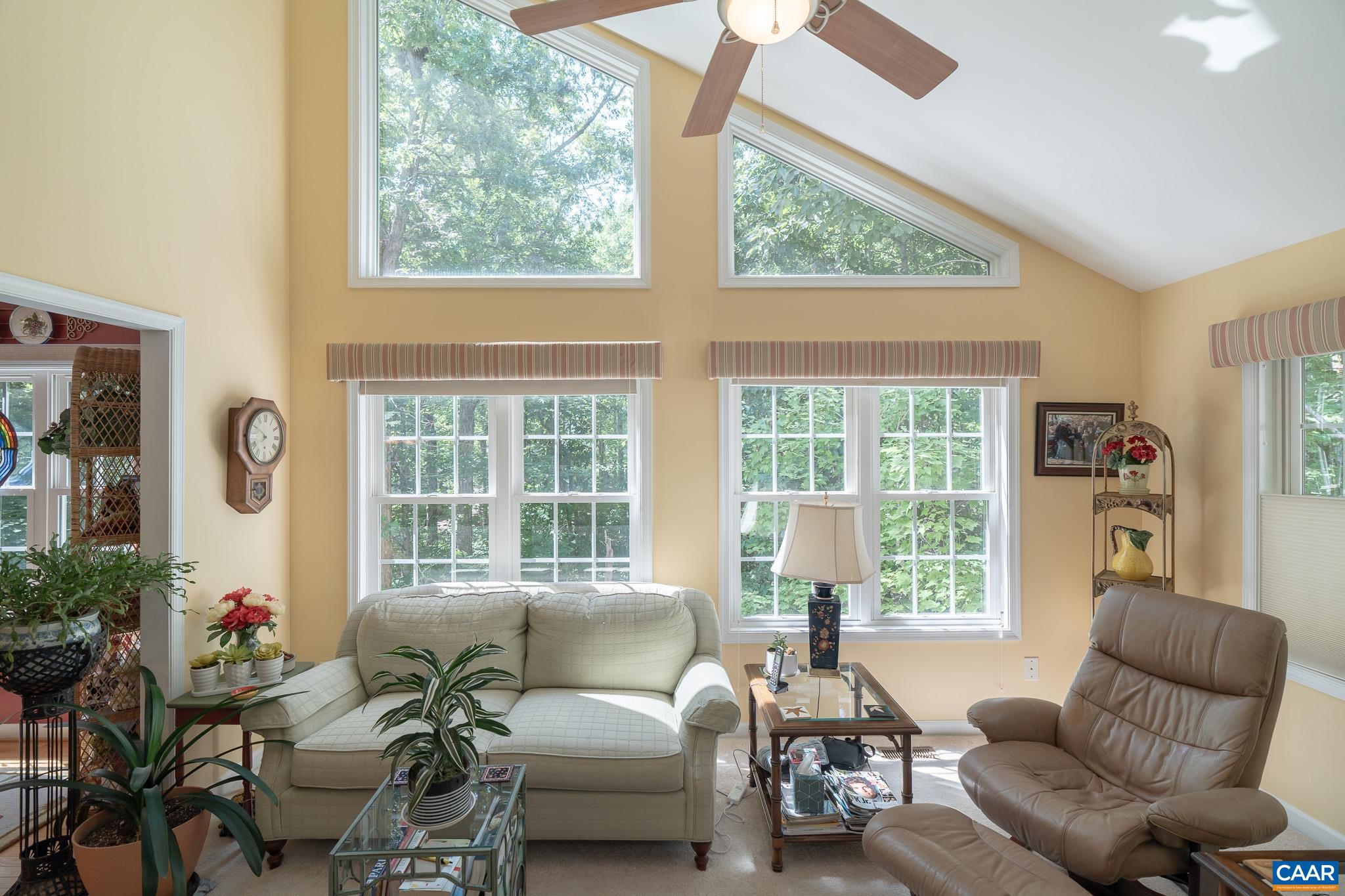 9 Hawks Place Palmyra, VA 22963 - Photo 26 of 63 a living room with furniture and a large window