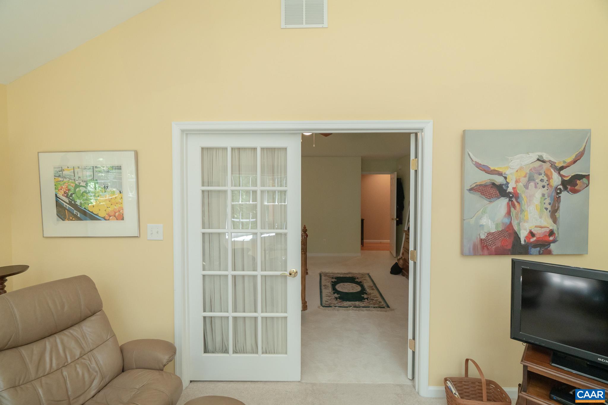 9 Hawks Place Palmyra, VA 22963 - Photo 27 of 63 a living room with furniture and a flat screen tv