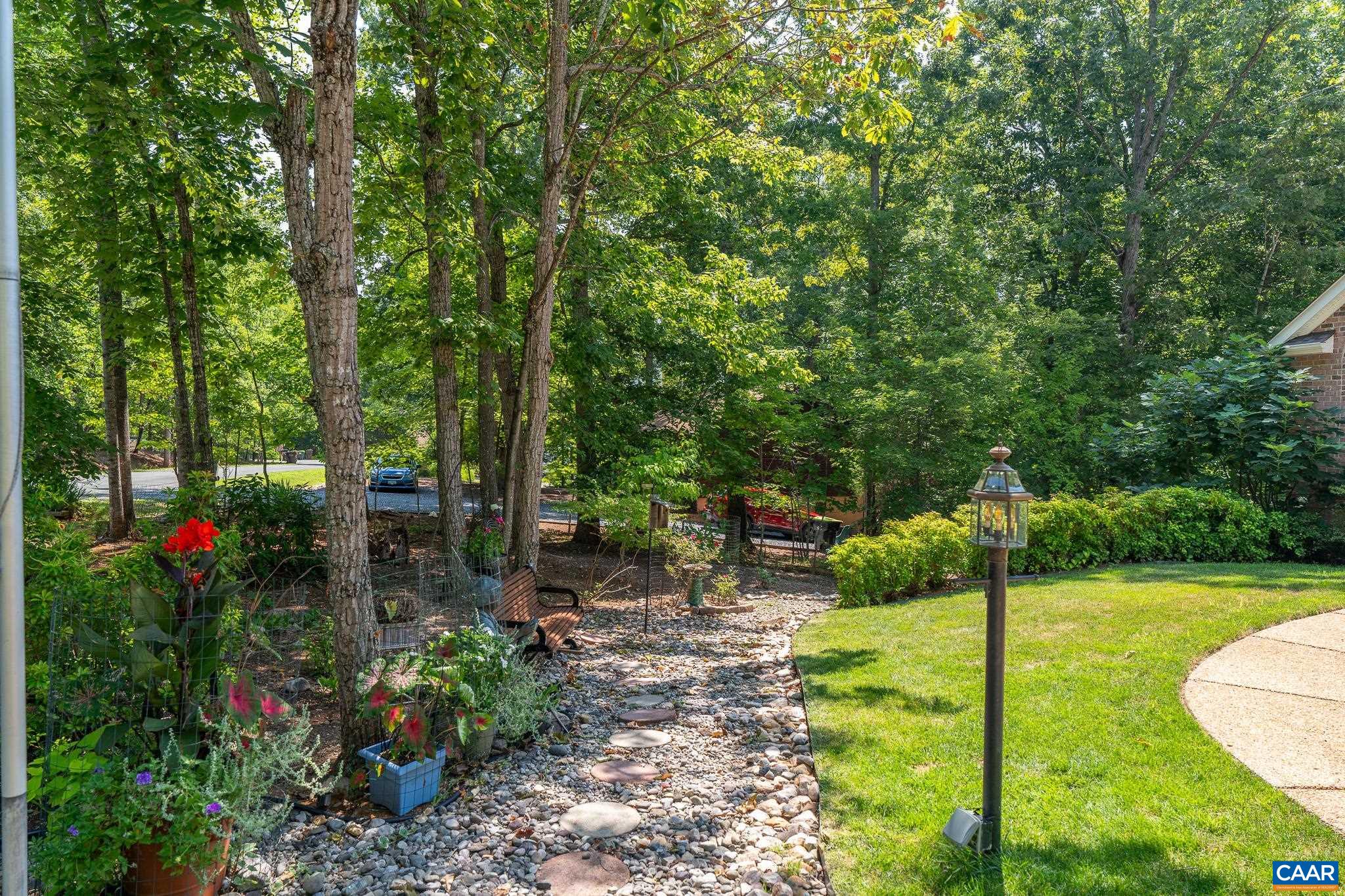 9 Hawks Place Palmyra, VA 22963 - Photo 3 of 63 a view of a garden with a patio