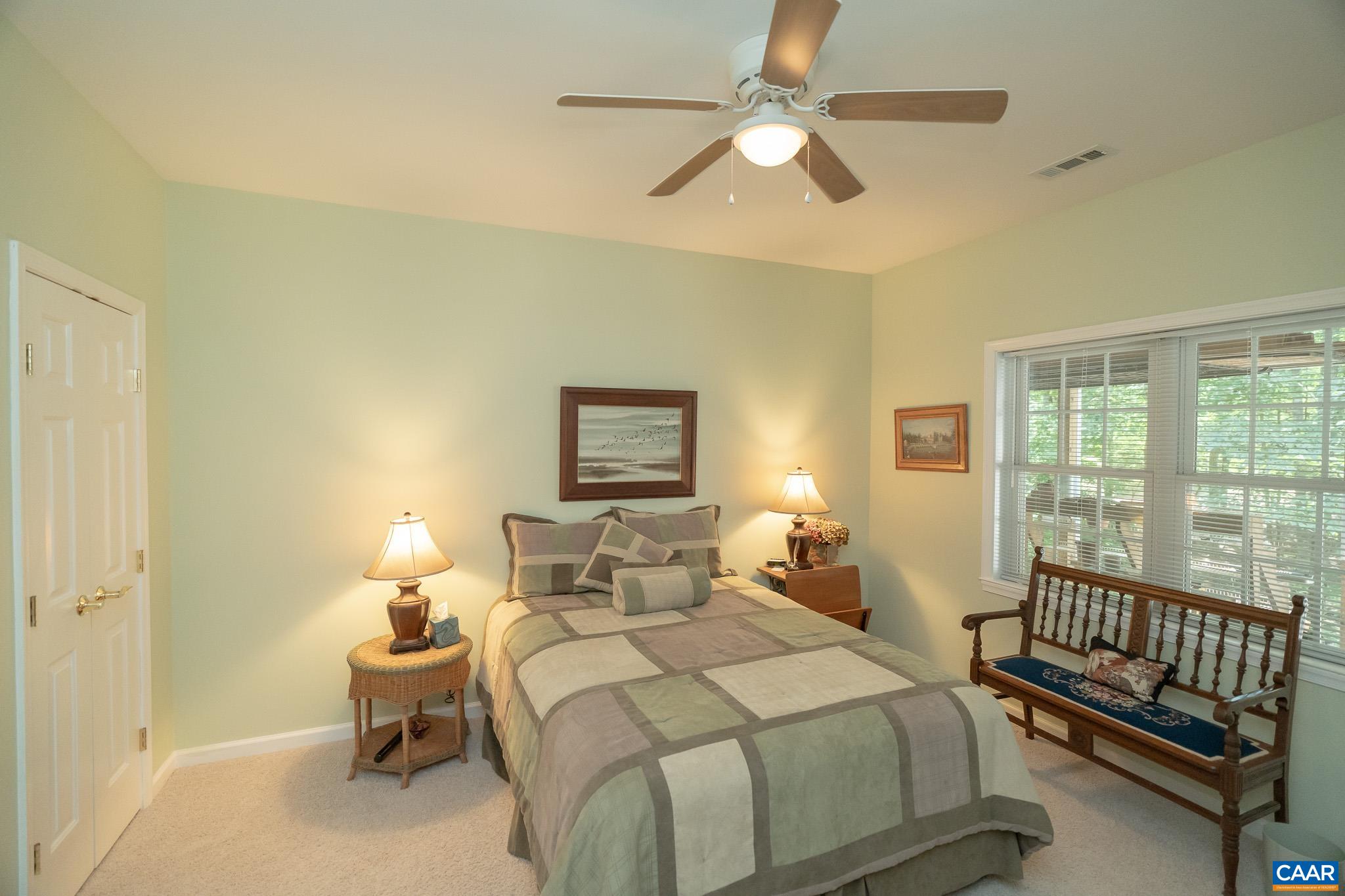 9 Hawks Place Palmyra, VA 22963 - Photo 48 of 63 a bedroom with a bed and a window