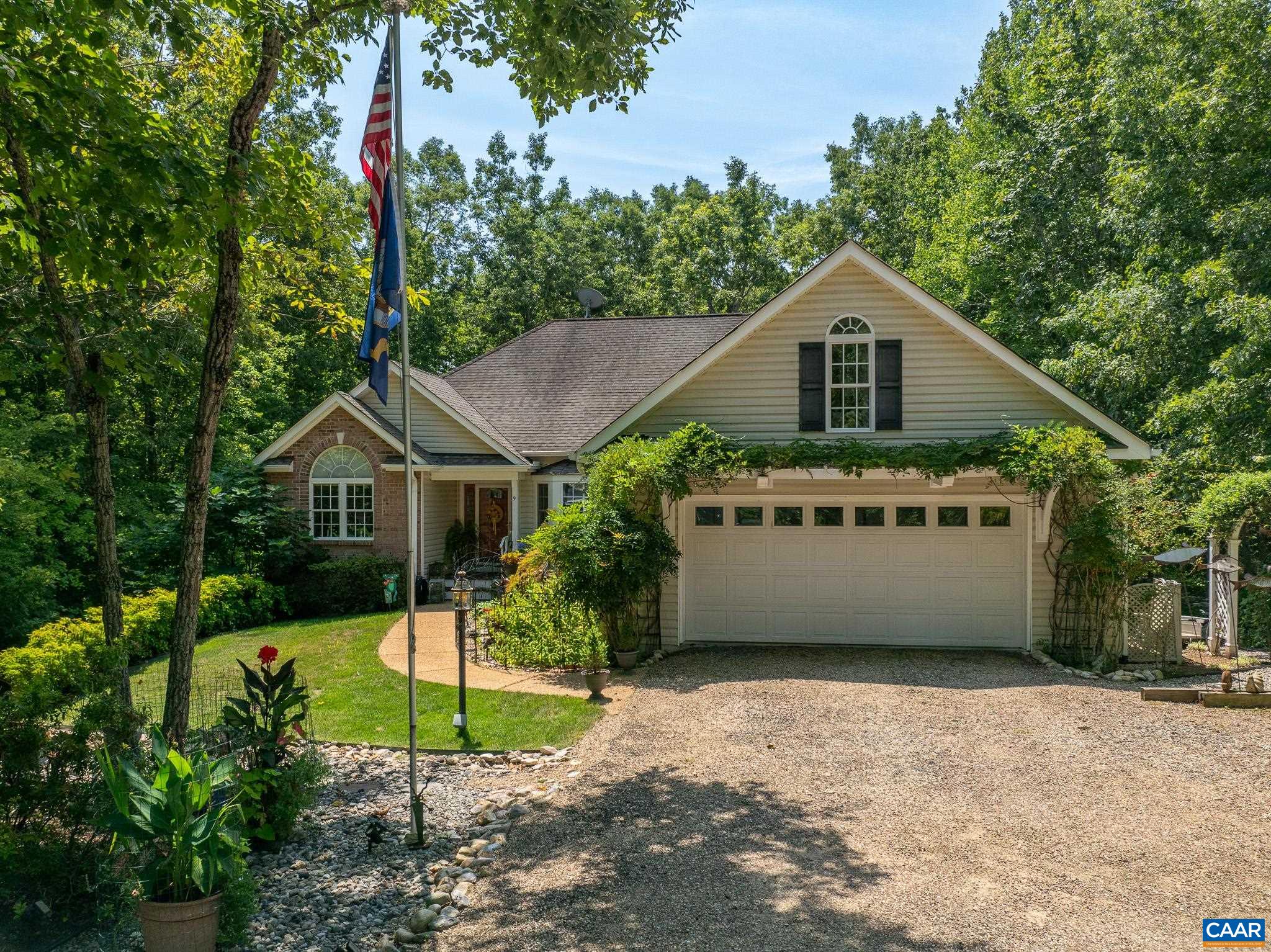 9 Hawks Place Palmyra, VA 22963 - Photo 63 of 63 a view of a house with a yard and large trees