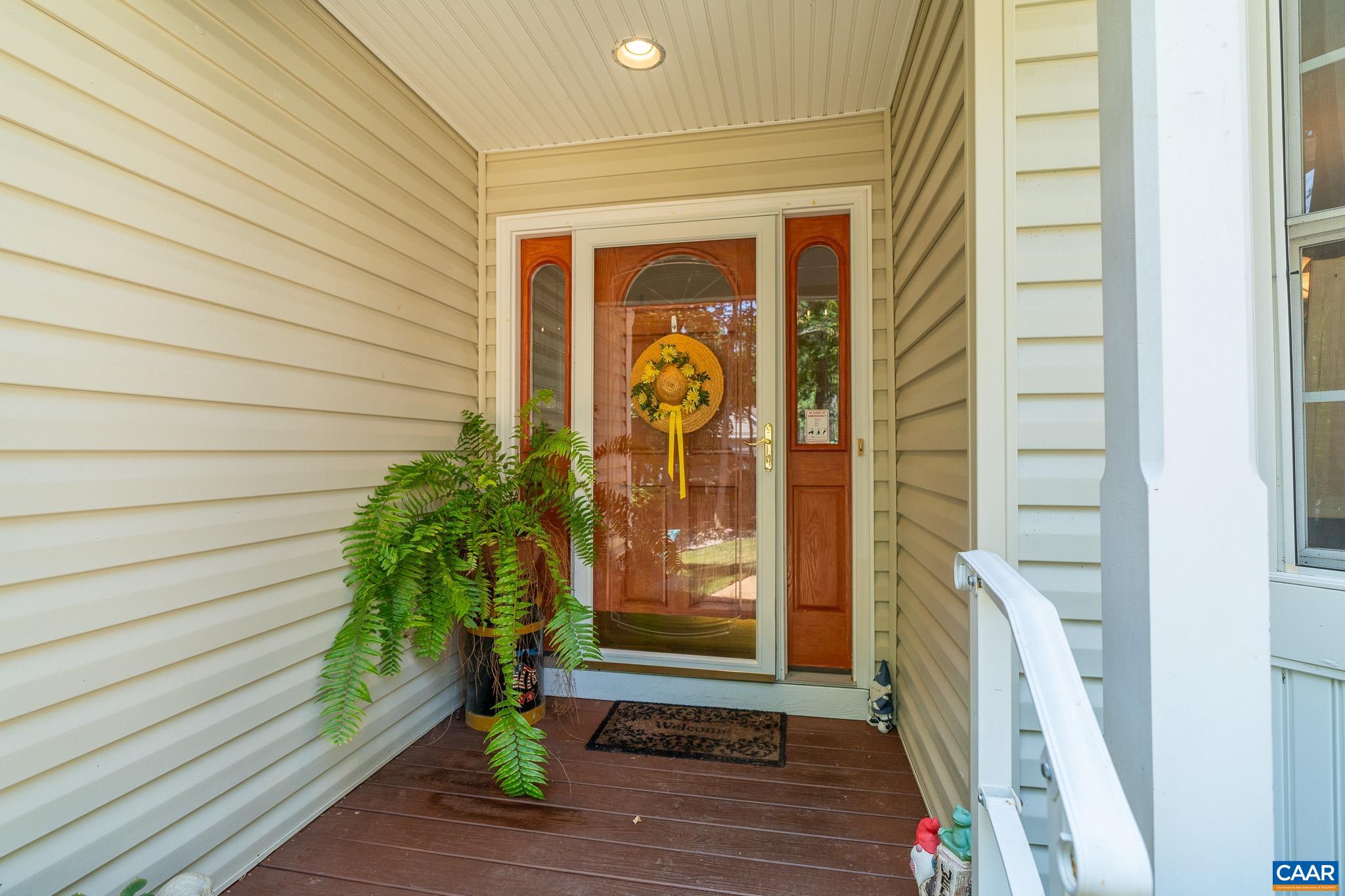 9 Hawks Place Palmyra, VA 22963 - Photo 7 of 63 a front view of a house with a glass door