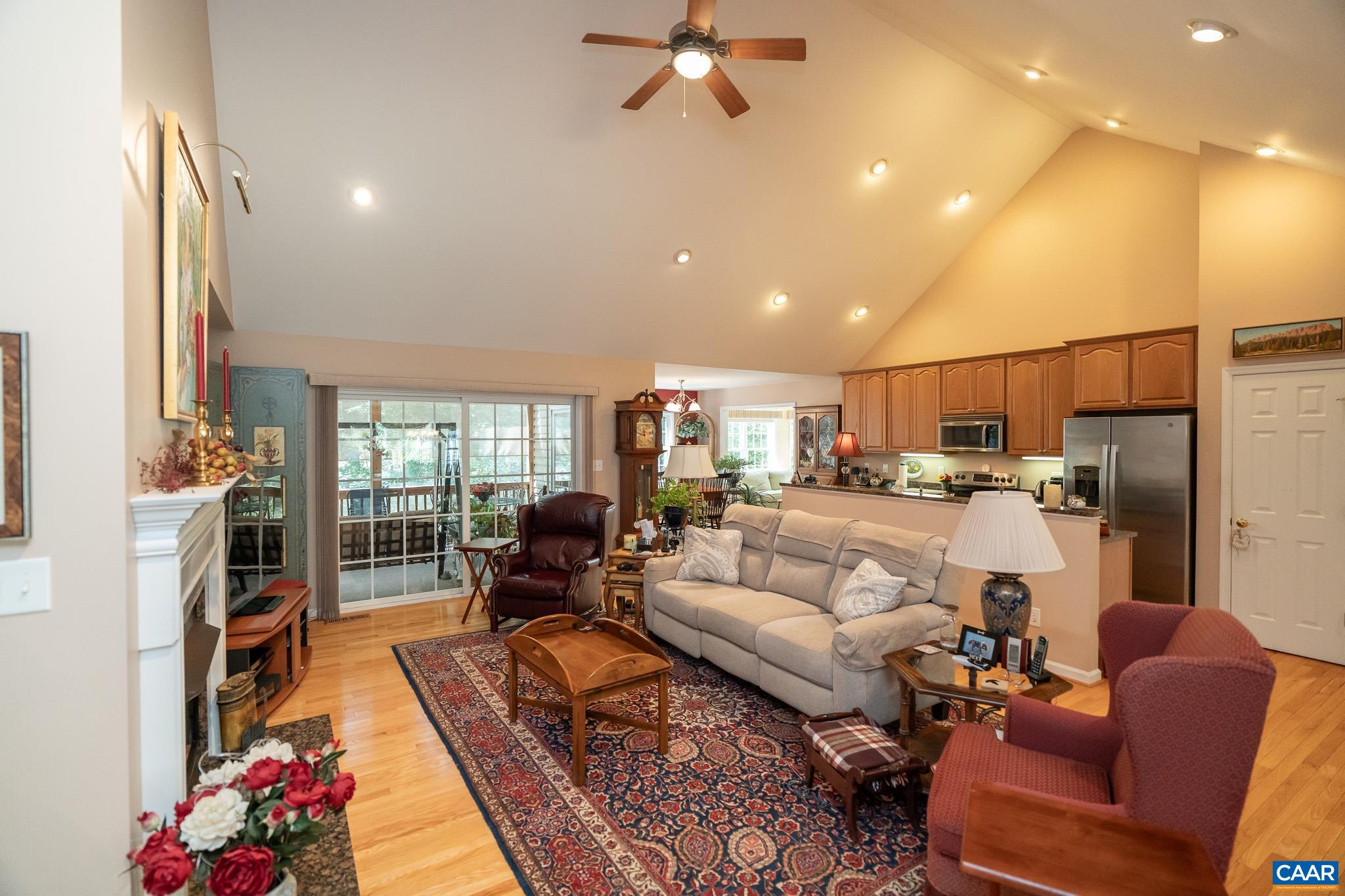 9 Hawks Place Palmyra, VA 22963 - Photo 8 of 63 a living room with furniture fireplace and a flat screen tv
