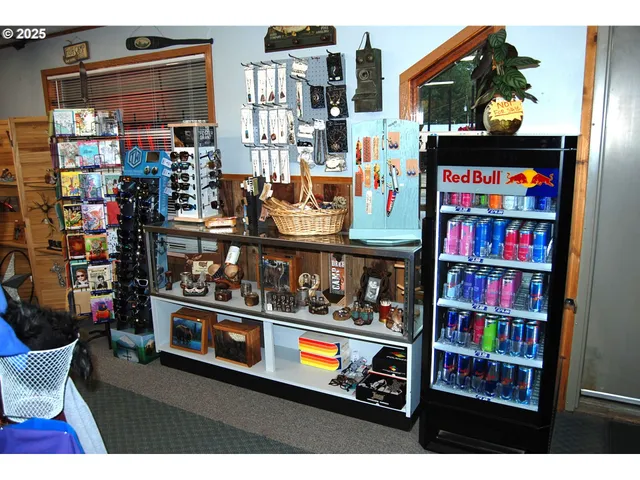 a store area with lots of different kinds of fruit and vegetables