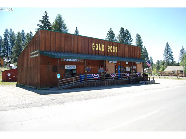 a view of street with large trees