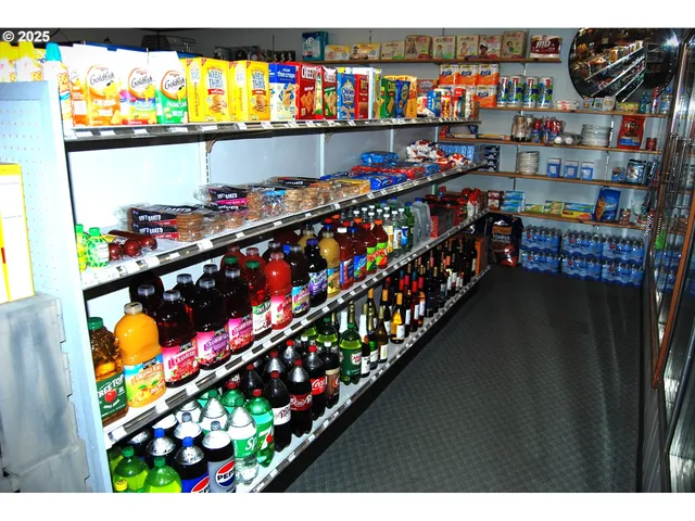 a kitchen area with lots of different kinds of food