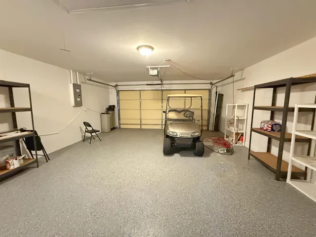 a view of a livingroom with furniture and toys