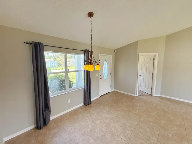 a view of an empty room with window