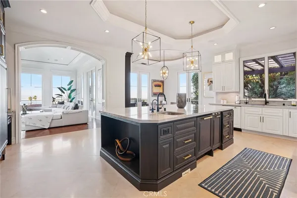a spacious bathroom with a double vanity sink a mirror and a bathtub