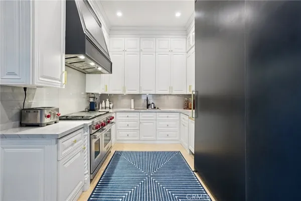 a bedroom with a bed and a view of bathroom